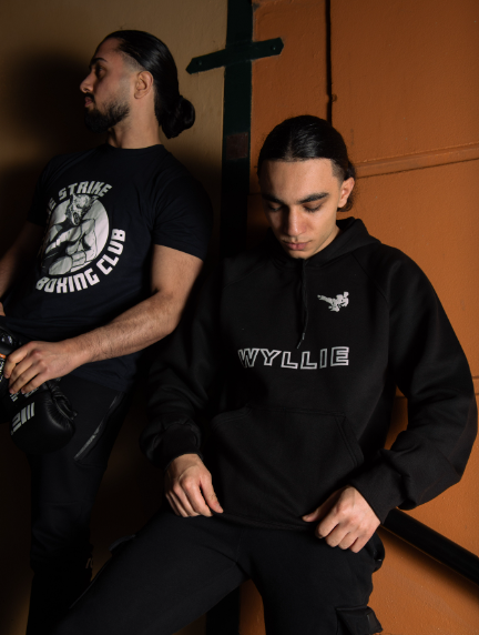WYLLIE Black Hoodie – Regular Fit, 100% Cotton, with Iconic Side Kick Logo